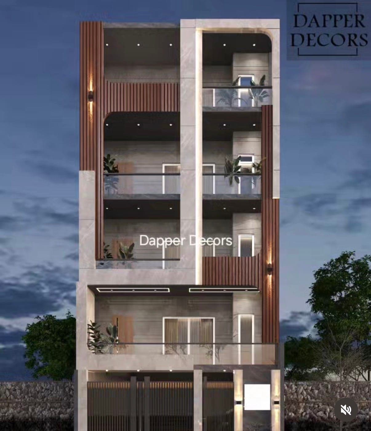 Grey marble frame facade with walnut fins and a vertical light slot at night
